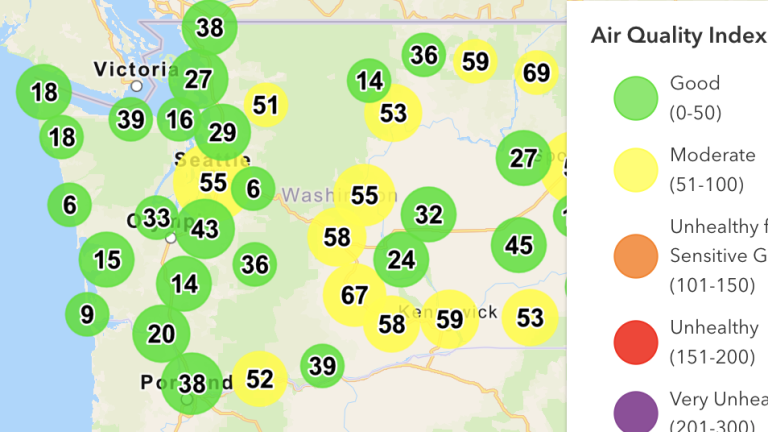 Map of Washington with yellow and green circles indicating air quality measurements.