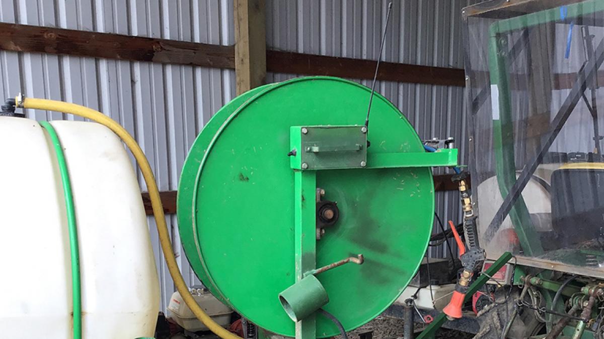 Farm equipment, pesticide applicator hose reel