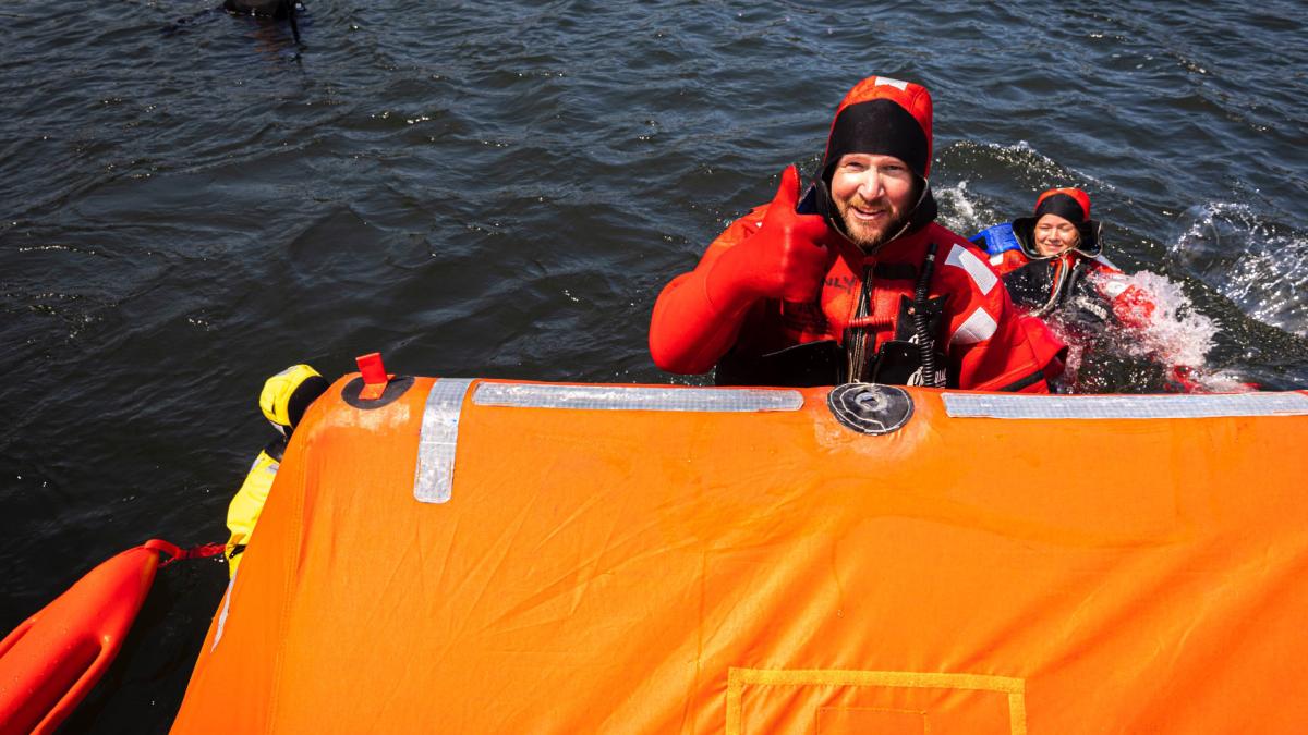 Image of a fisherman in an immersion suit
